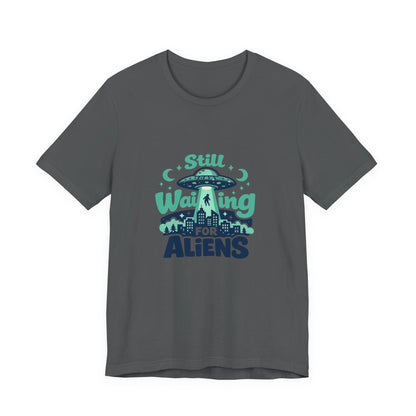 Still Waiting for Aliens T-Shirt — Funny UFO Graphic Tee for Sci‑Fi Fans Printify