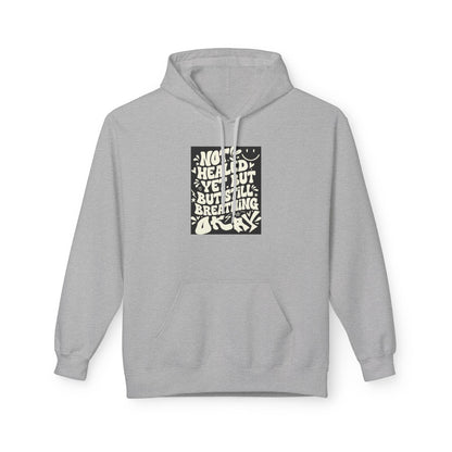 Inspirational Quote Hoodie — "Not Healed Yet But Still Breathing" Graphic Sweatshirt Printify