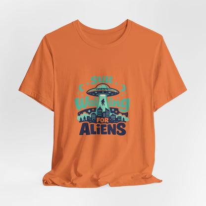 Still Waiting for Aliens T-Shirt — Funny UFO Graphic Tee for Sci‑Fi Fans Printify