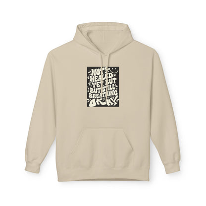 Inspirational Quote Hoodie — "Not Healed Yet But Still Breathing" Graphic Sweatshirt Printify