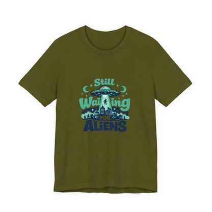 Still Waiting for Aliens T-Shirt — Funny UFO Graphic Tee for Sci‑Fi Fans Printify