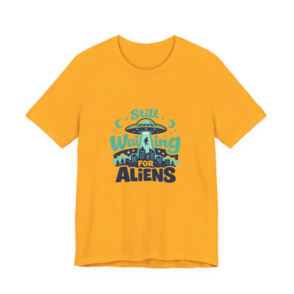 Still Waiting for Aliens T-Shirt — Funny UFO Graphic Tee for Sci‑Fi Fans Printify